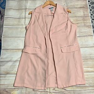 Long pink sleeveless coat